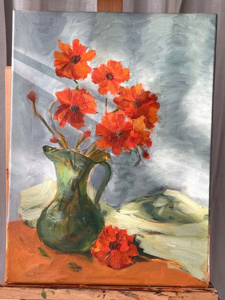 Image of a painting of orange cosmos flowers in a jade vase, sitting on a table with a towel and single orange flower